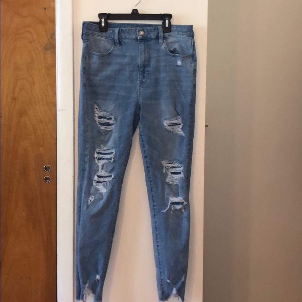 light blue ripped jeans